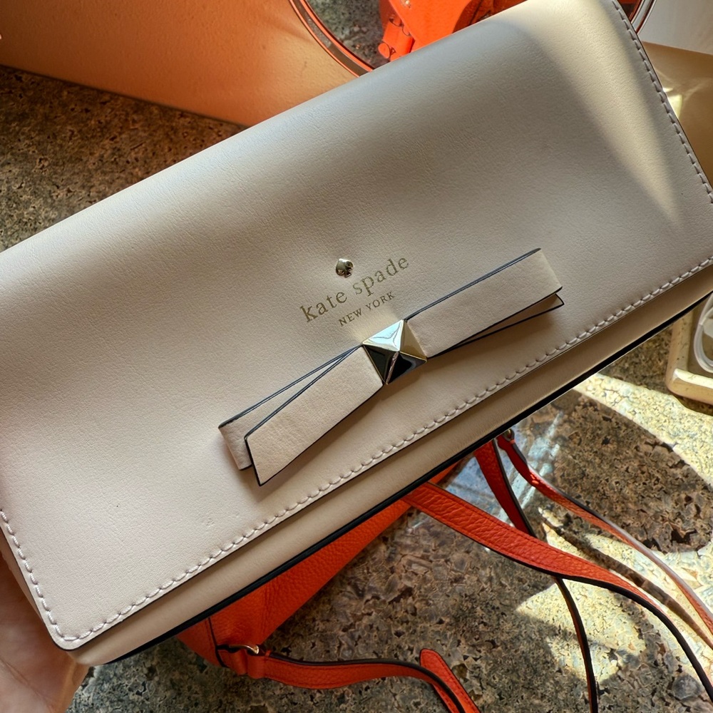Kate Spade Cream Clutch with Bow Detail
